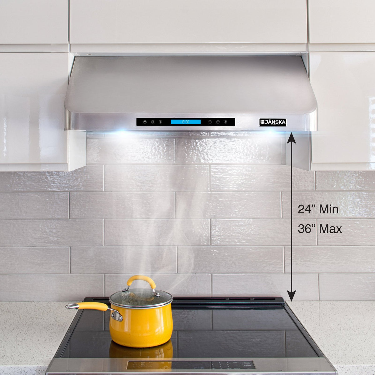 Janska range hood with a yellow pot on a stove, showing smoke and labeled dimensions.