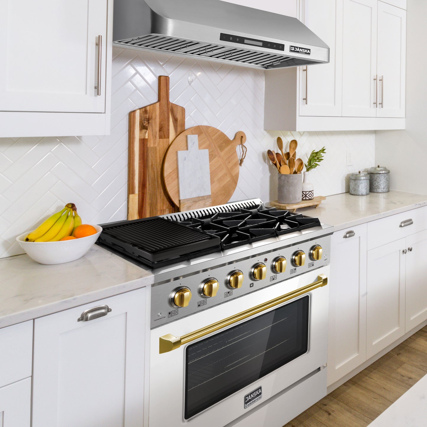 Modern kitchen with a stove and wooden cutting boards on the wall